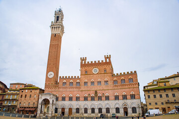 Obraz premium Torre del Mangia at Piazza del Campo, a tower in Siena, Tuscany, Italy