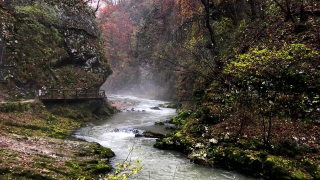 Vintgar Gorge in Slovenia within the Triglav National Park. Gorge full of water set in the beauty of nature with the Radovna river flowing near Bled in Slovenia in the autumn time.