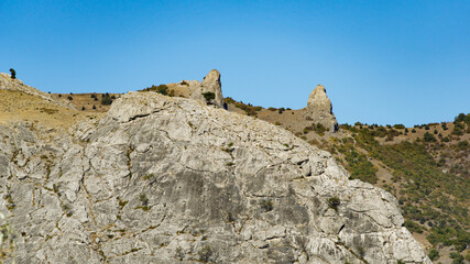 Mountain Two brothers above Veseloe village near Sudak. Crimea mountain landscape on sunny autumn day.