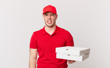 pizza deliver man feeling disgusted and irritated, sticking tongue out, disliking something nasty...
