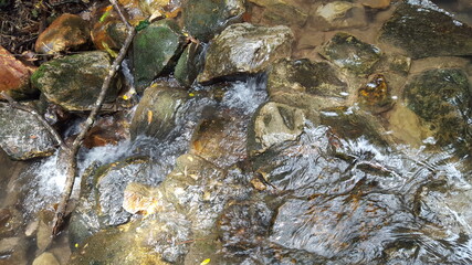 Fototapeta premium Water among rocks