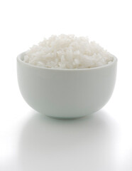 Jasmine cooked rice in a white bowl isolated on white background, Suitable as a design element.