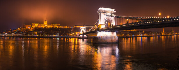 Evening panorama of The Royal palace of Buda castle and the Chain Bridge in Budapest. Hungary