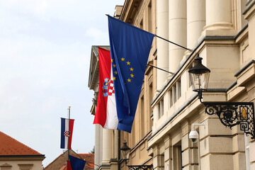 Flags of Croatia and European Union on Croatian Parliament building in Zagreb.