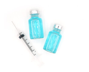 Top view Syringe and Vaccine bottle isolated on white background, Protect from Coronavirus or COVID-19 epidemic concept