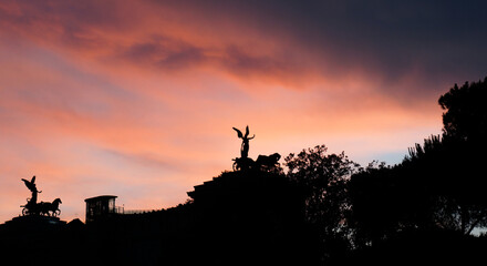 Silhouette of Rome against the background of a beautiful, red sunset