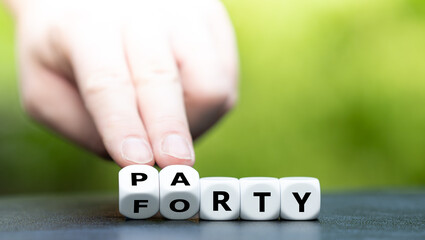Symbol for having a birthday party by getting forty. Dice form the words forty and party.
