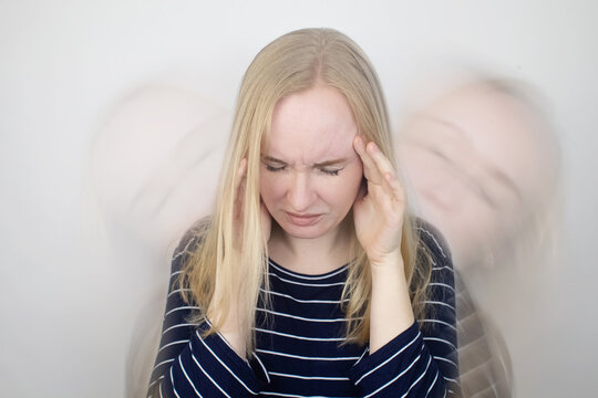 Woman Loses Consciousness And Falls Down Due To Dizziness And Disturbance Of The Vestibular Apparatus. Severe Headache And Migraine. Concept Of Helping People Suffering From Migraines And Dizziness