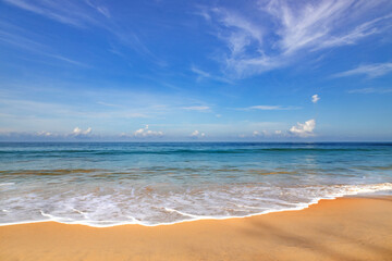 Phuket beach sand and sky in Thailand. Crystal clear water and the sky. Landscape view of beach in summer day morning.