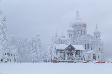 Belogorsk monastery on the mountain in winter, covered with white snow and frost. Belogorye, Perm Territory, Ural, Russia