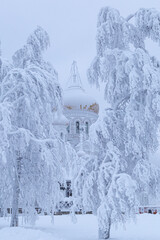 Belogorsk monastery on the mountain in winter, covered with white snow and frost. Belogorye, Perm Territory, Ural, Russia