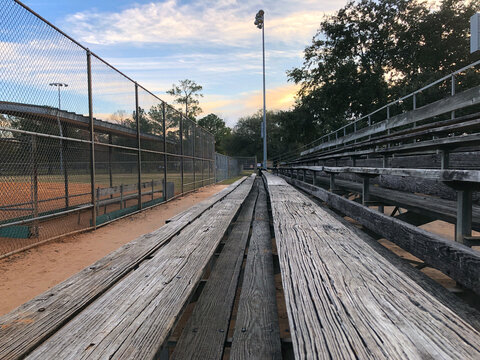 Empty Bleachers On A Baseball Field 