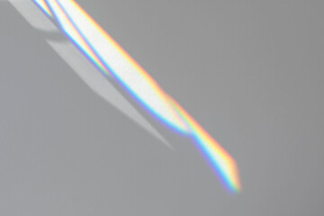Blurred rainbow light refraction texture overlay effect for photo and mockups. Organic drop...