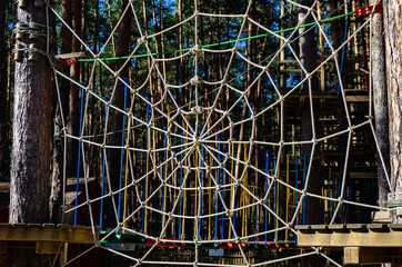 A web of ropes in an amusement and adventure park.