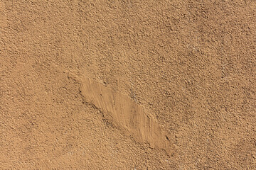Textured rough plaster wall