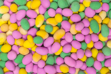 Fototapeta na wymiar Group of colorful peanuts in glaze.