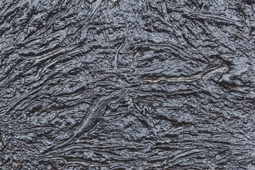 Black bitumen abstract dark pattern texture background, industrial oil refinery waste