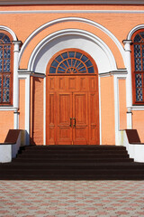 Wooden door in an old stone building