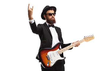 Obraz premium Bearded male musician with an electric guitar gesturing a peace sign