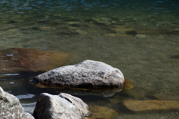 Rocks in the crystal clear water