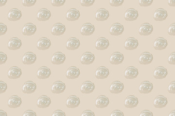 Abstract cosmetic background from drops of transparent gel or antiseptic, hyaluron. Creative pattern