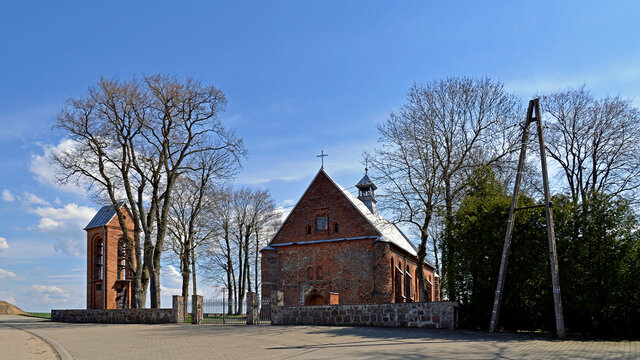 built in the second half of the 16th century in the Gothic style, the Catholic Church of st. Matthias in the village of Pawłowo in Masovia, Poland. The photos show a general view of the temple with th