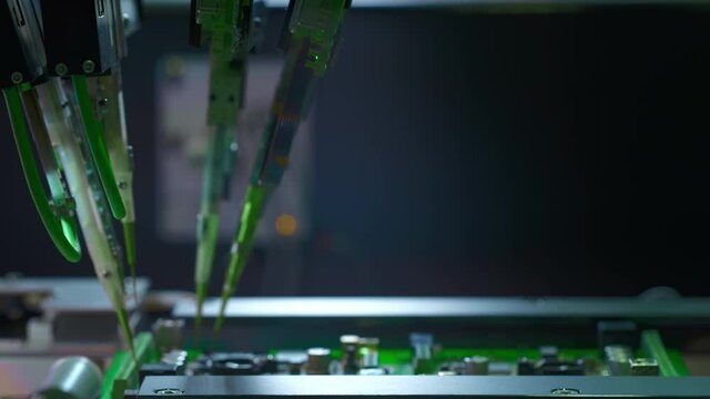 Chip production. Installation of transistors and components. Diagnostics of electrical contacts. Automatic machine for creating digital electronic boards. Needles injected Electronic circuit