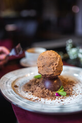 Chocolate sugar dessert in restaurant. Art food concept