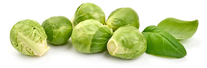 Fototapeta premium Fresh green Brussels sprouts, isolated on white background. High resolution image