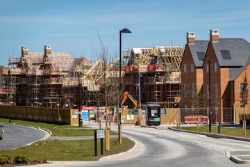 Winchester, Hampshire, England, UK. 2021. New housing north of Winchester  with some under...
