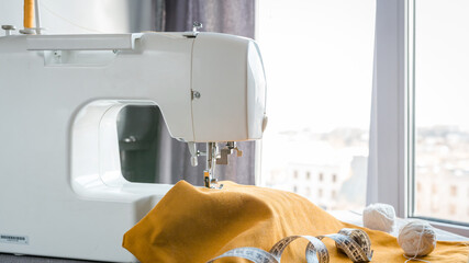 Sewing. Recycling Made by hand from home. The sewing machine and the project  quarantine, lockdown....