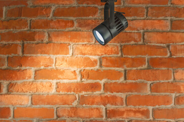 brick wall and spotlight