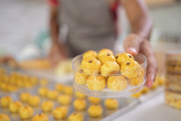 close up of nastar pineapple cake in container plastic product