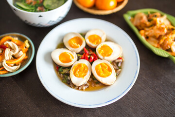 Asian family lunch set in Lunar New Year days with mayak eggs dish