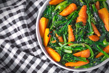 Fried baby broccoli mixed baby carrots