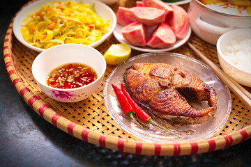 Fried fish dish in Vietnamese style family lunch set