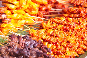 Grilled skewers of pig's viscera, selling in street food market (Thailand)
