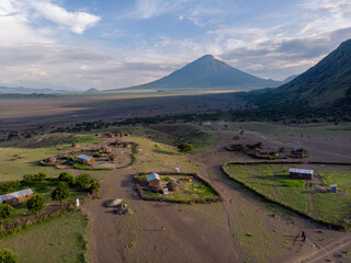 Aerial Drone Shot. Traditional Masai village at Sunset time near Arusha, Tanzania