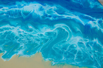 Epoxy resin art. Imitation of the sea. Sea foam. Modern trendy hobby. Macro photo
