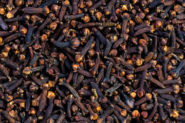 Macro photography of Cloves are the aromatic flower buds of a tree in the family Myrtaceae, Syzygium aromaticum.