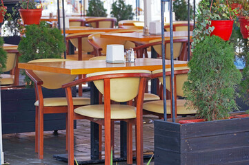 chairs and tables in the summer cafe