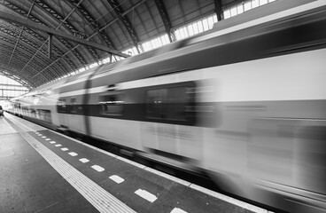 Train speeding up in Amsterdam Central Station