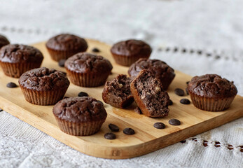 Homemade chocolate muffins on a wooden table