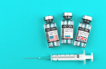 Choosing the best vaccine from USA, UK or Russia, COVID-19 vaccine vials with flags of countries,...