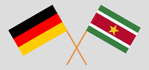 Crossed flags of Germany and Suriname. Official colors. Correct proportion