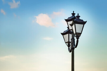 Beautiful vintage lantern against the sky.