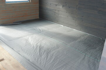 insulation of the floor in a frame house.
