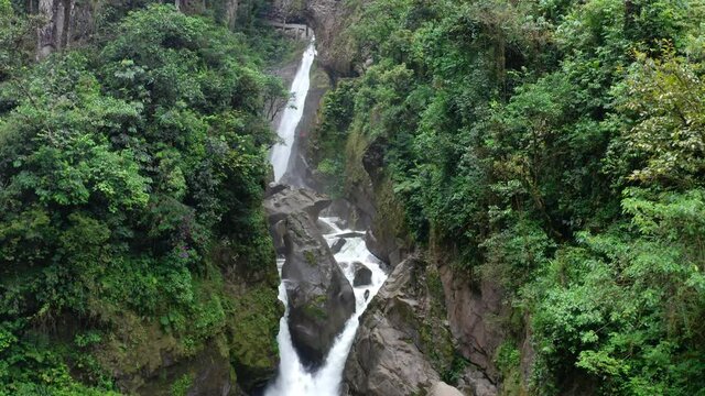El pailon del diablo, the eight most beautiful world wonder: a 80 meter high waterfall with many tourist alongside
