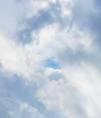Stormy cloudy sky with light and dark clouds