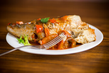 whole fish hake stewed with carrots, beets, peppers and other